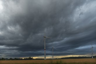 Wind turbines on the motorway Rain clouds, wiping technique, Mecklenburg-Western Pomerania,