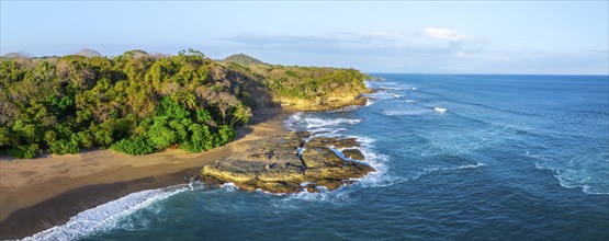 Aerial view, rainforest, sandy beach and coast with waves, Playa Cocalito, Puntarenas, Costa Rica,