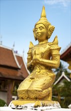 Deity statue, Wat Sensoukaram, Luang Prabang, Laos, Asia