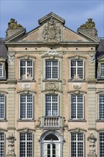 Façade with high relief architectural ornaments above windows of 1750 Poeke Castle, Kasteel van