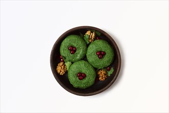 Spinach phali, a traditional Georgian dish, top view, on a white background, no people, food