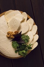 Imereti cheese, Georgian imeruli cheese, top view, no people, on a wooden table