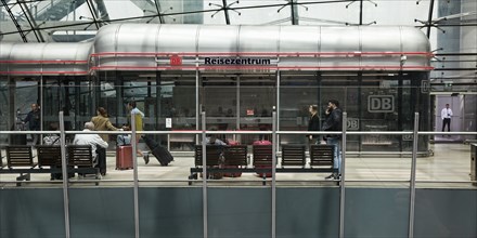 Travellers at the DB Travel Centre, central hall above the long-distance train station, The