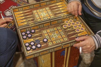 Two men playing backgammon, Turkey, Asia