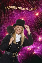 Female chimney sweep in front of fireworks on New Year's Eve, Lower Saxony, Federal Republic of