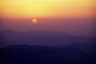 Sunset in Himalayas Shivalik hills. Shimla, Himachal Pradesh, India, Asia