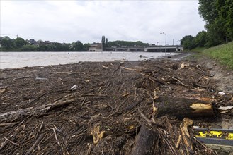 Symbolic image extreme weather, global warming, climate change, floods, alluvial wood, barrage on