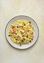 Tagliatelle pasta, in cream sauce with salmon, homemade, no people