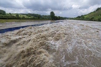 Symbolic image Extreme weather, global warming, climate change, floods, barrage on the Neckar