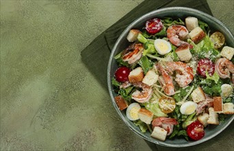 Caesar salad, with tiger prawns, shrimp salad, lettuce, quail eggs, cherry tomatoes, parmesan