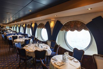 Luxury restaurant on a cruise ship that hosts dinners and entertainment events