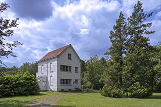 Typical white house at the Colony of Wortel near Hoogstraten, province of Antwerp, Flanders,