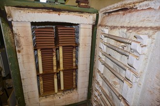 A view inside a kiln where bricks are stacked for firing, Patmos Cotto brickworks, Traditional