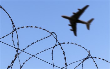 Symbolic image, deportation flights of illegal and delinquent migrants, image of a flying aircraft