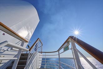 View from the deck of a cruise ship Mein Schiff 6 to the sunny sea and clear sky, North Sea,