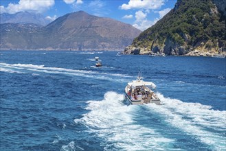 Capri, Campania, Italy, June 16, 2022: Italy, scenic views of Capri from boat cruise around the