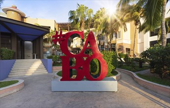 Marina and yacht club area in Cabo San Lucas with restaurants, cafes and shopping malls