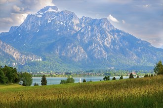 Lake Forggensee in front of the fairytale castles Schwanstein Castle and Hohenschwangau Castle in