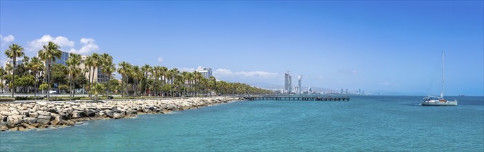 Cyprus, Limassol, Molos seafront promenade and scenic views of Olimpia coast and financial center,