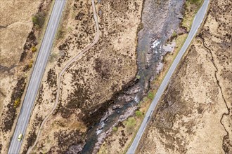 Top down view of road, path and river in the Glen Coe valley, Scotland, UK