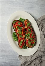 Traditional Turkish dish, Imam Bayildi, stuffed eggplant, with tomatoes and herbs, baked, no