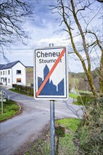 Town sign Cheneux Stoumont next to the bunker of Cheneux, view of the street and the famous house