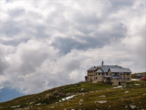 Sciliar House under a cloudy sky, Dolomites, Sciliar, South Tyrol, Italy, Europe