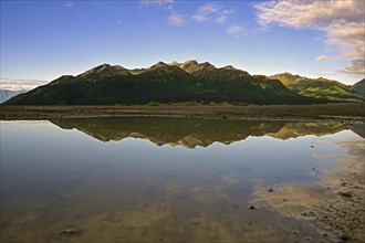 Reflection of the Wrangell Mountains from the Kennecott Copper Mine, Alaska, USA, North America