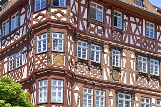 Mosbach, Germany, June 2021: Corner of facade of old historic timber framing building called