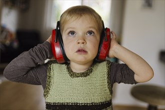 Toddler with headphones, Bonn, 03/04/2024