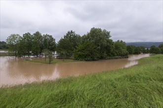 Symbolic image extreme weather, global warming, climate change, flood retention basin, flood