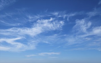 Peaceful and serene sky with clouds background