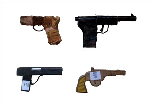 Fake handguns like imitation revolver and wooden semi-automatic pistols made by prisoners, inmates