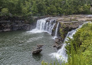 People playing on the rocks above the Little River Falls in Little River Canyon Falls Park near Ft.