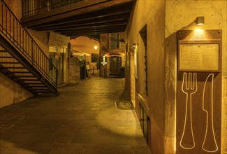 Restaurant sign with knife and fork in Borghetto, Valeggio sul Mincio, Province of Verona, Italy,