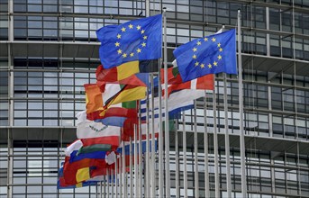 European flags in the wind in front of the European Parliament, Louise Weiss Building, Strasbourg,