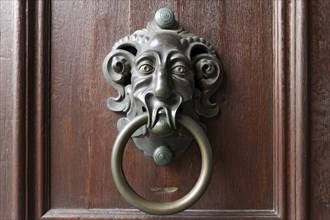 Old door knocker with face of a mythical creature, New Residence, Bamberg, Upper Franconia,