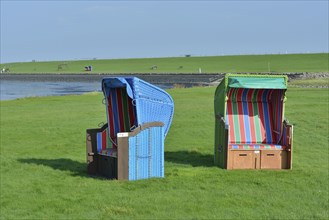 Roofed wicker beach chairs at the Hörn swimming spot, Pellworm, North Frisia, Schleswig-Holstein,