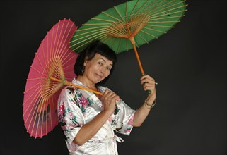 Asian dance with umbrellas