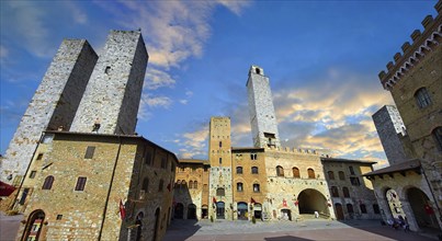 The Piazza Duomo (Cathedral Square) of San Gimignano with its medieval towers built as defensive