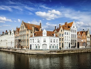 Benelux EuropeTravel concept, Bruges canal and old historic houses of medieval architecture.