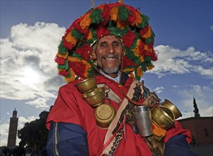 Morocco, water seller on the Place Djemaa El Fna in Marrakech, Africa