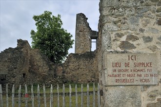 Memorial plaque on the destroyed house. The burnt village of Oradour-sur-Glane was destroyed on 10