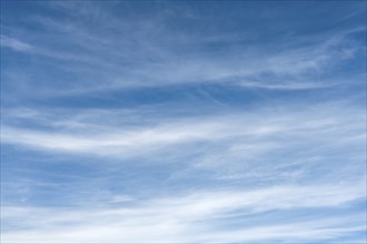 Cirrostratus, veil clouds against blue sky, Germany, Europe