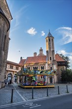 Children's carousel in front of Dankwarderode Castle, Brunswick, Lower Saxony, Germany, Europe