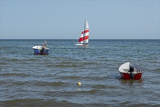 Sailing boat in front of the south beach, Göhren, Rügen Island, Mecklenburg-Western Pomerania,