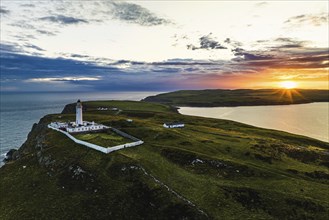 Sunset over Mull of Galloway Lighthouse from a drone, Mainland Scotland, Scotland, UK