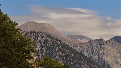 Entrance to the gorge, entrance, Xyloskalo, blue sky, grey-white clouds, Samaria gorge, Omalos,