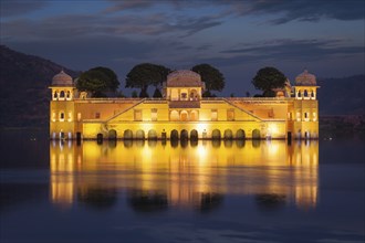 Rajasthan landmark, Jal Mahal Water Palace on Man Sagar Lake in the evening in twilight. Jaipur,