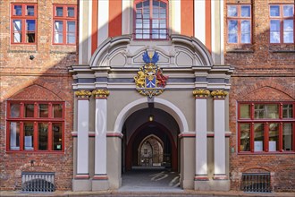 Baroque grand portal with city coat of arms from the Swedish occupation period on the west side of